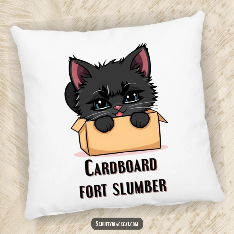 Funny scruffy black kitten pillow, showing it peeking out from a cardboard box with a sly, mischievous grin.