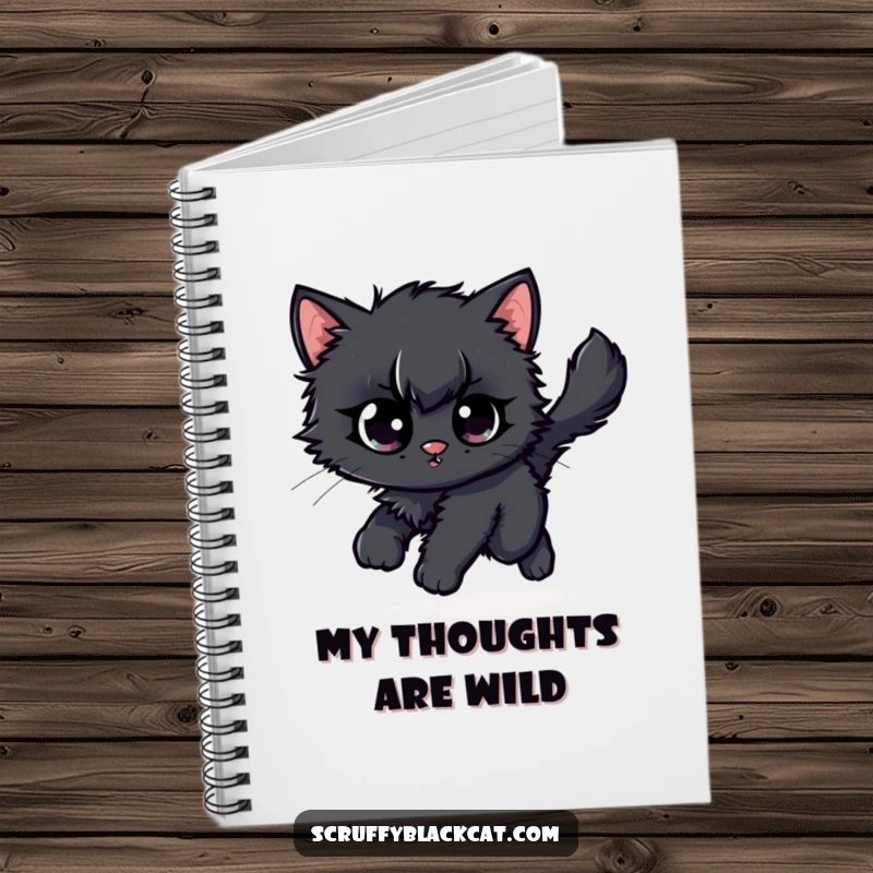 Funny scruffy black kitten notebook cover, showing it comically chasing its own fluffy tail with wide, enthusiastic eyes.