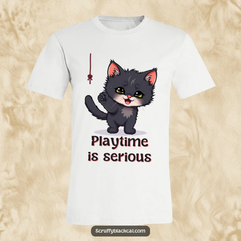 Funny t-shirt featuring a scruffy black kitten enthusiastically playing with a dangling string, embodying playful energy.